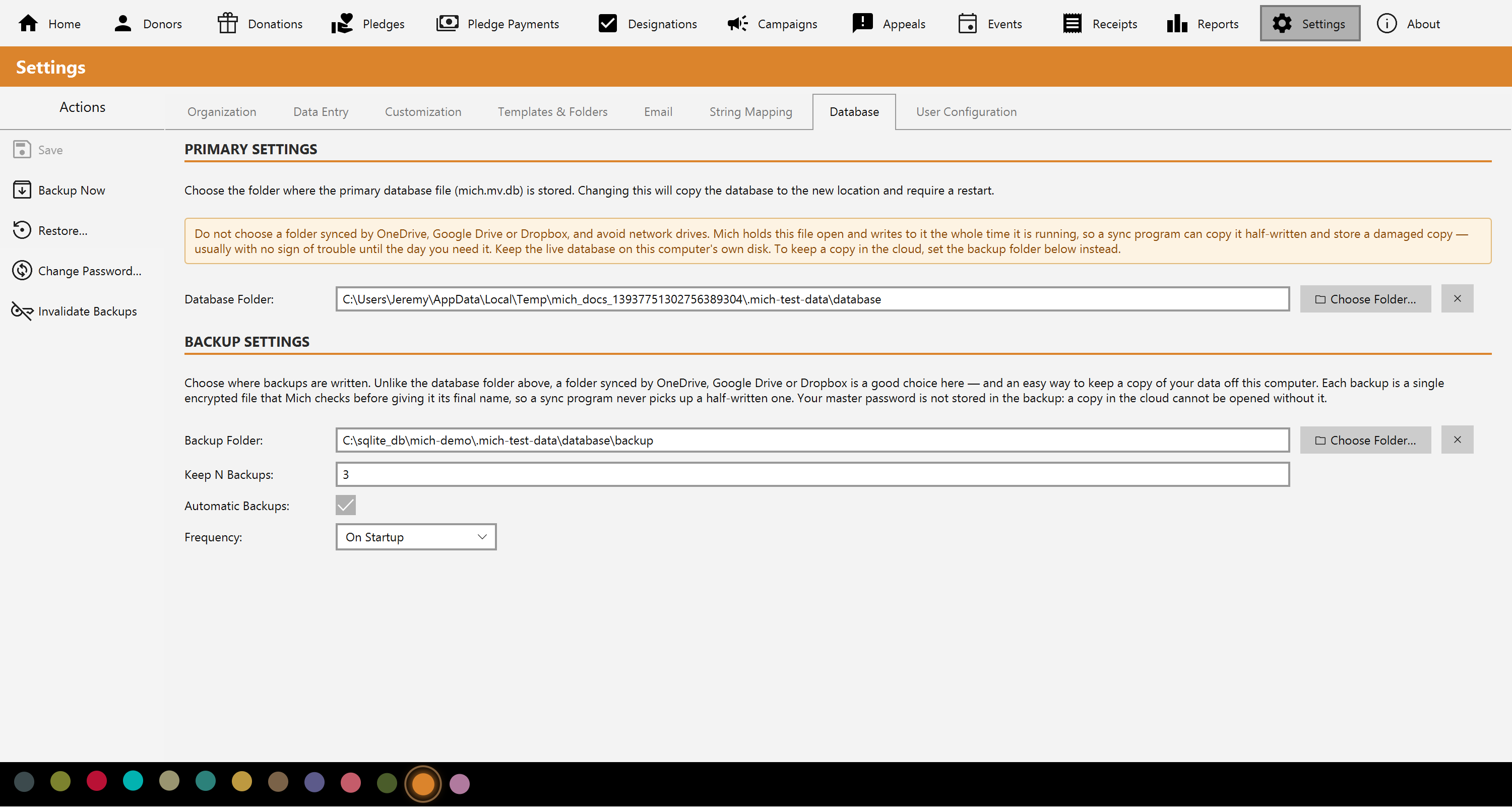 The Database tab of Settings, showing database and backup folders, retention and automatic backup scheduling
